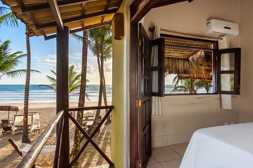 Premium Double Room Single Use, Beachfront | Minibar, desk, free WiFi, bed sheets