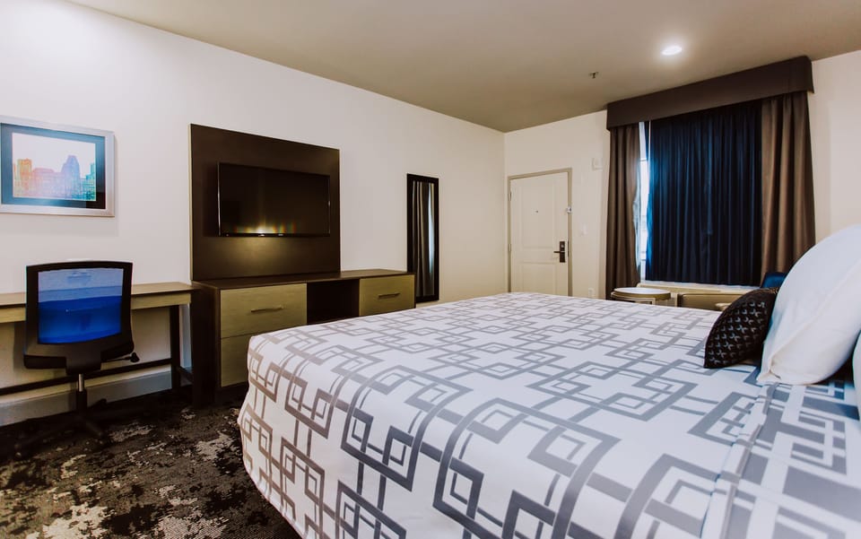 Basic Room, 1 King Bed | Desk, iron/ironing board, free wired internet, bed sheets