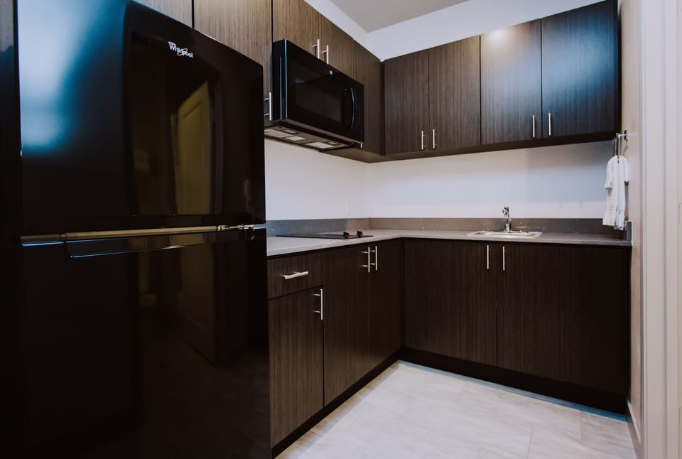 Basic Double Room, 2 Queen Beds | Bathroom | Separate tub and shower, towels