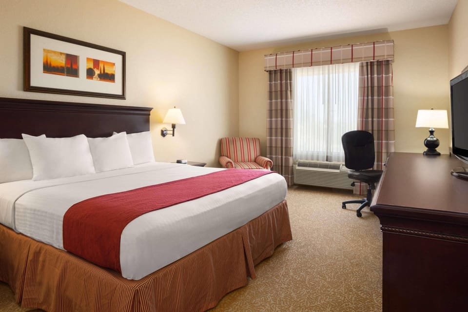 Premium bedding, desk, blackout drapes, iron/ironing board