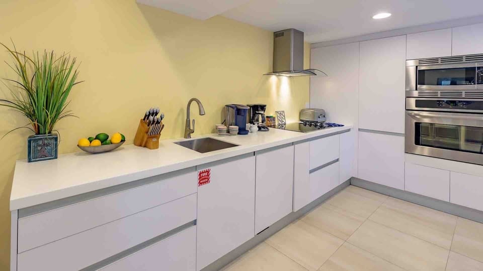 The kitchen has stainless steel appliances and plenty of cabinet space...