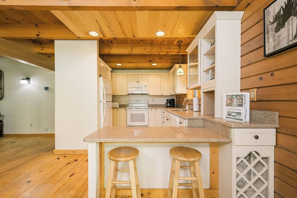 Kitchen and bar stool seating area.