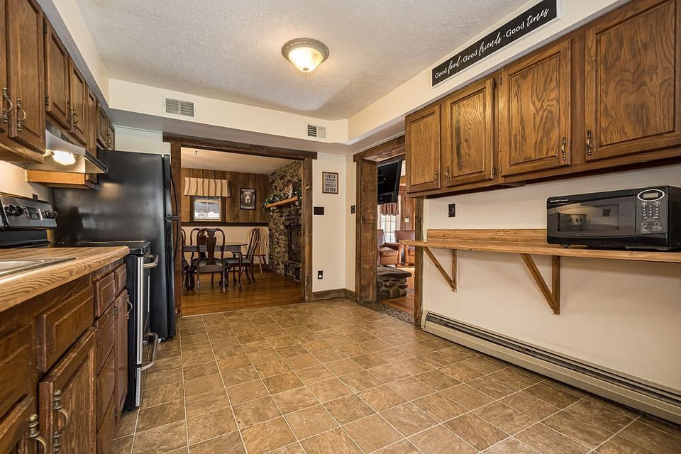 Kitchen - Main Level. Cozy kitchen feeds right into the dining room and living room.