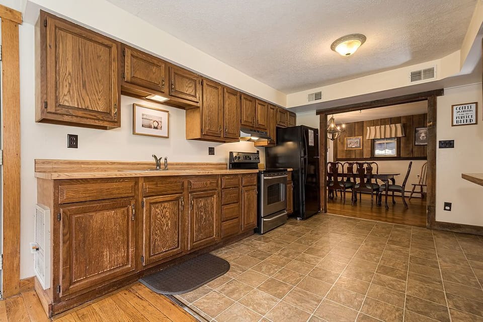 Kitchen - Main Level. Cozy kitchen feeds right into the dining room.