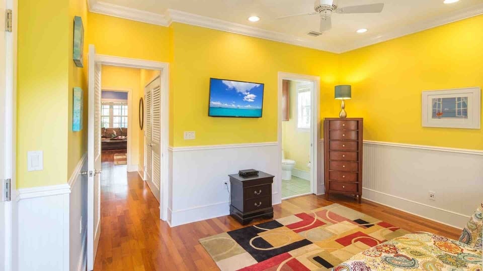The third bedroom has a flat screen TV and an en-suite bathroom...