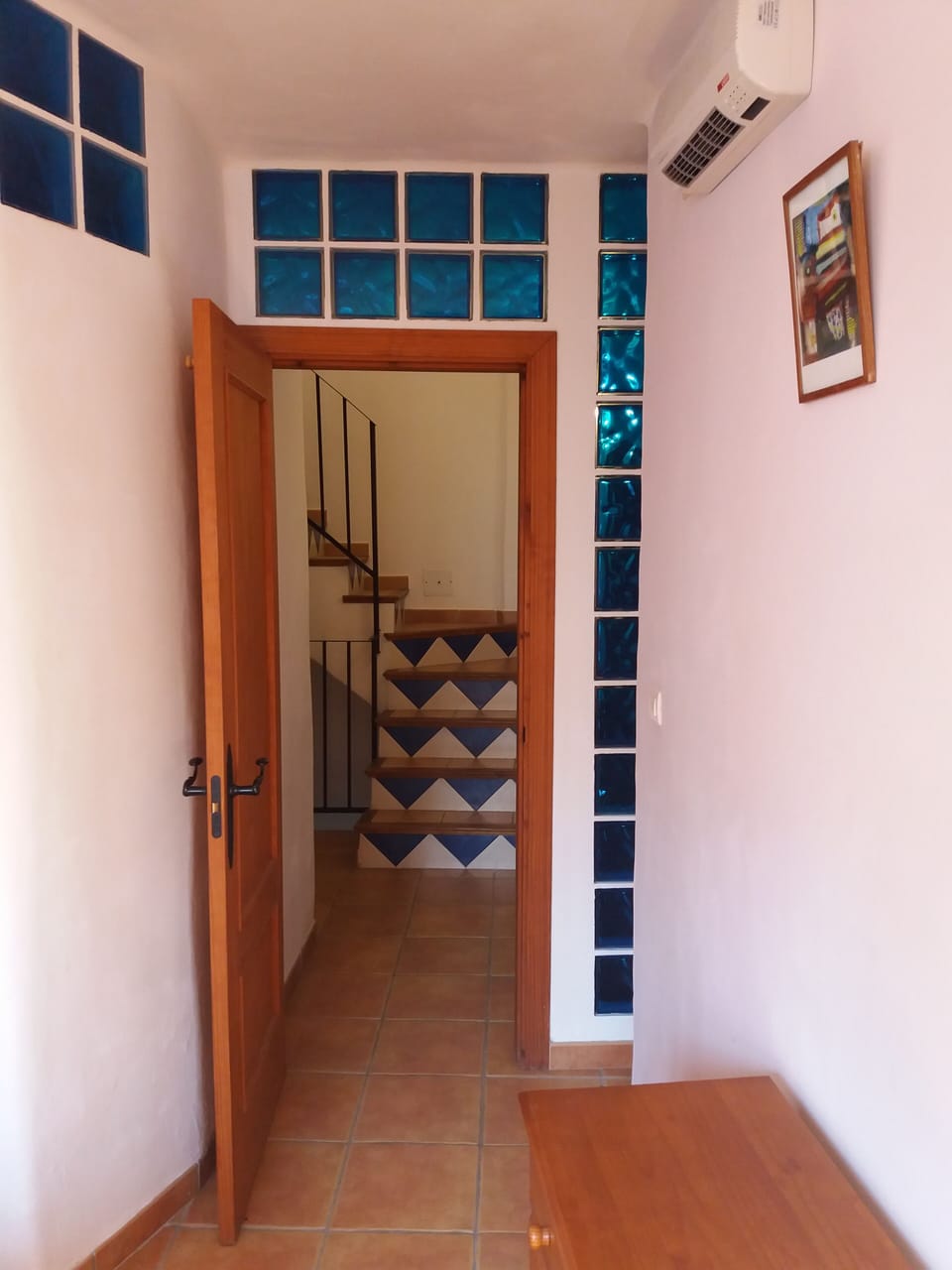 view from bedroom onto the hallway with pretty blue  blocks as feature
