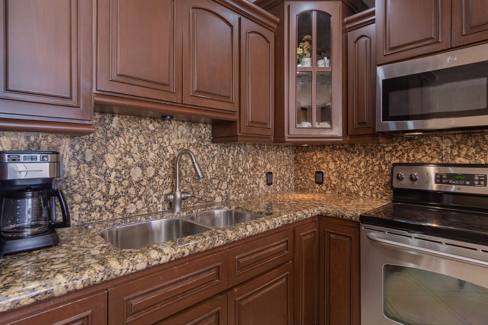Granite backsplash in the kitchen.