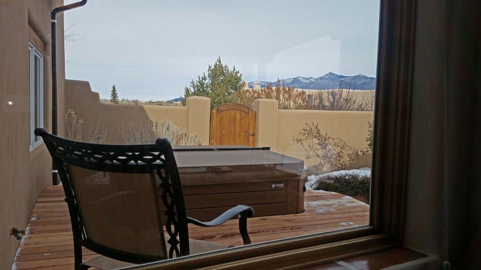 Hot tub built into deck for easy enter / exit