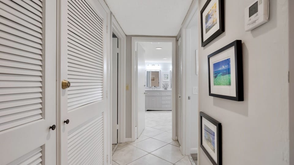 The master bedroom has large closets and an en-suite bathroom...