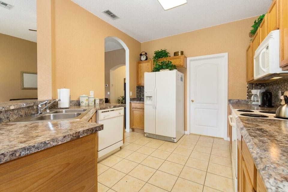 Bright kitchen with ample counter space and all the essentials.