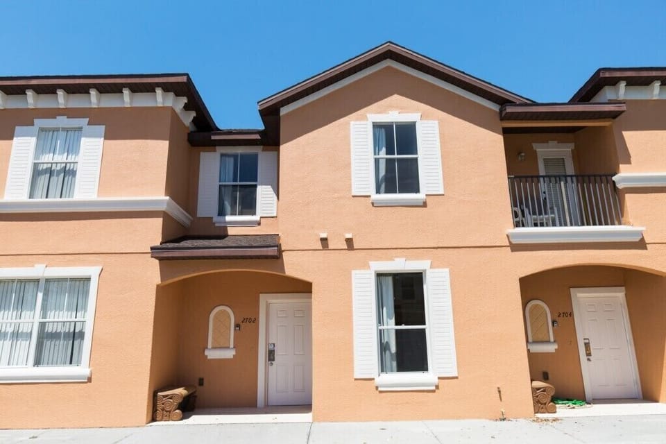 Charming exterior showcasing a modern townhouse design.