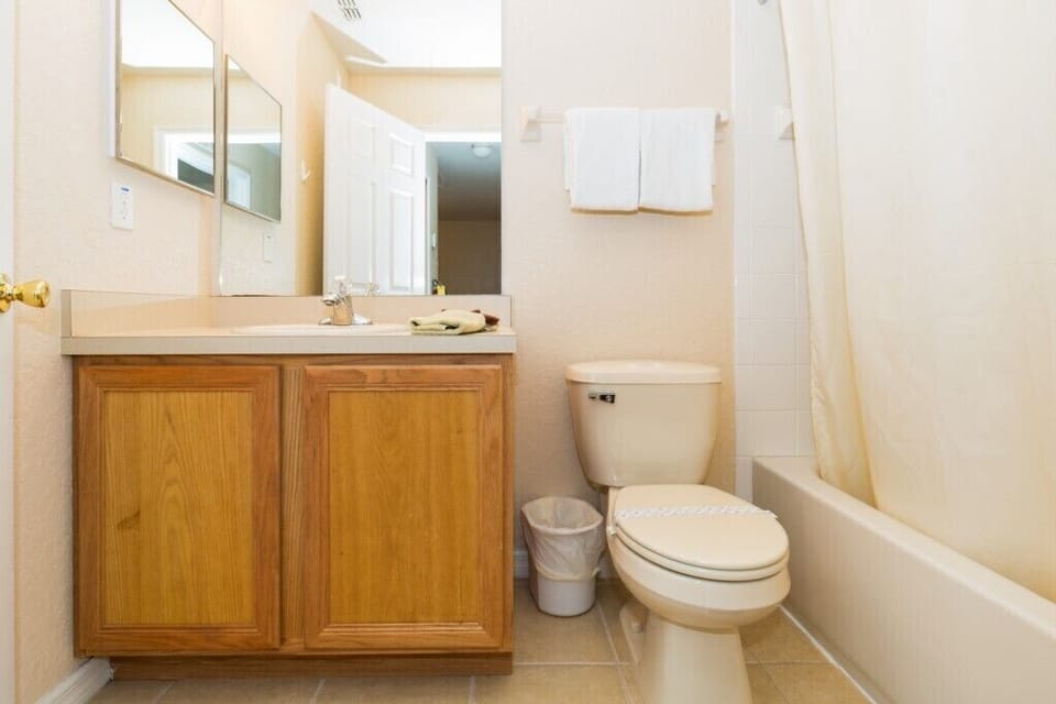 Modern bathroom featuring elegant fixtures and plenty of space.