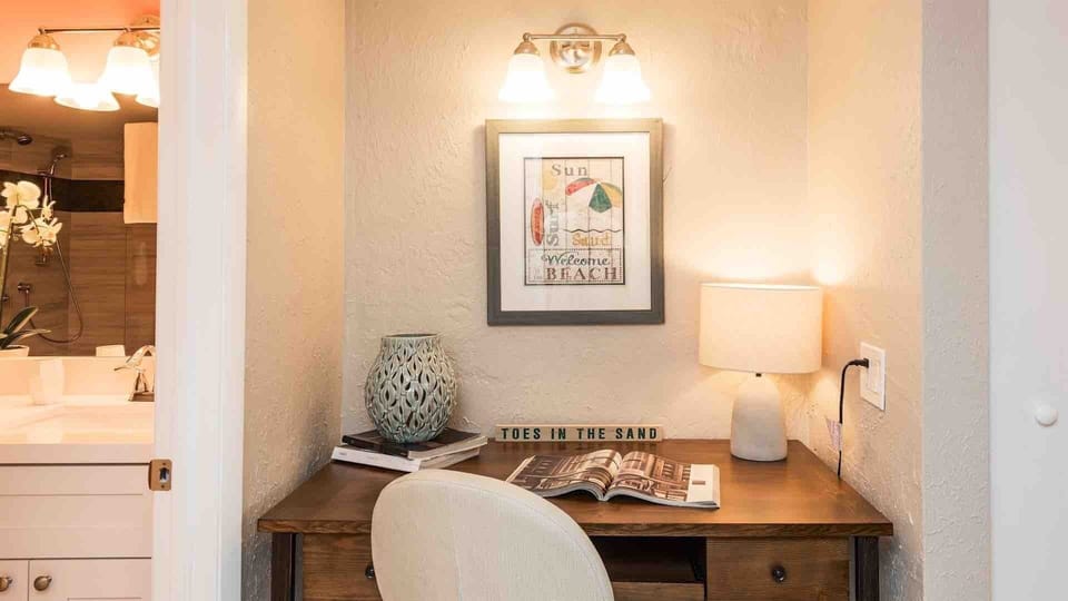 The master bedroom has a small desk space...