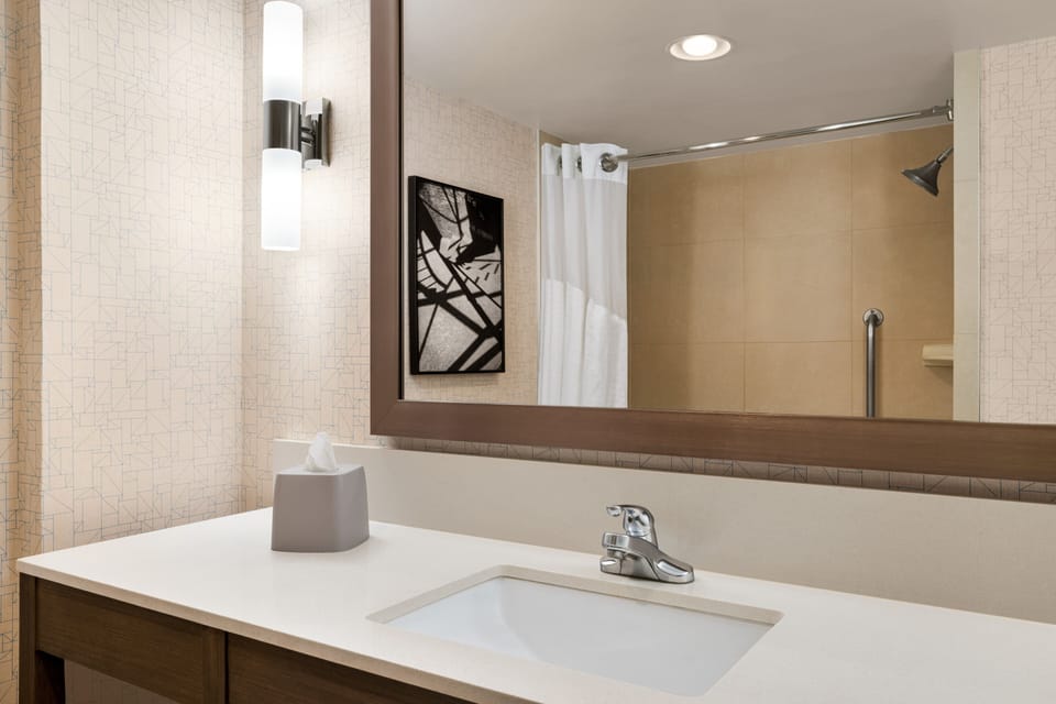 Suite, 1 Bedroom, City View | Bathroom | Combined shower/tub, free toiletries, hair dryer, towels