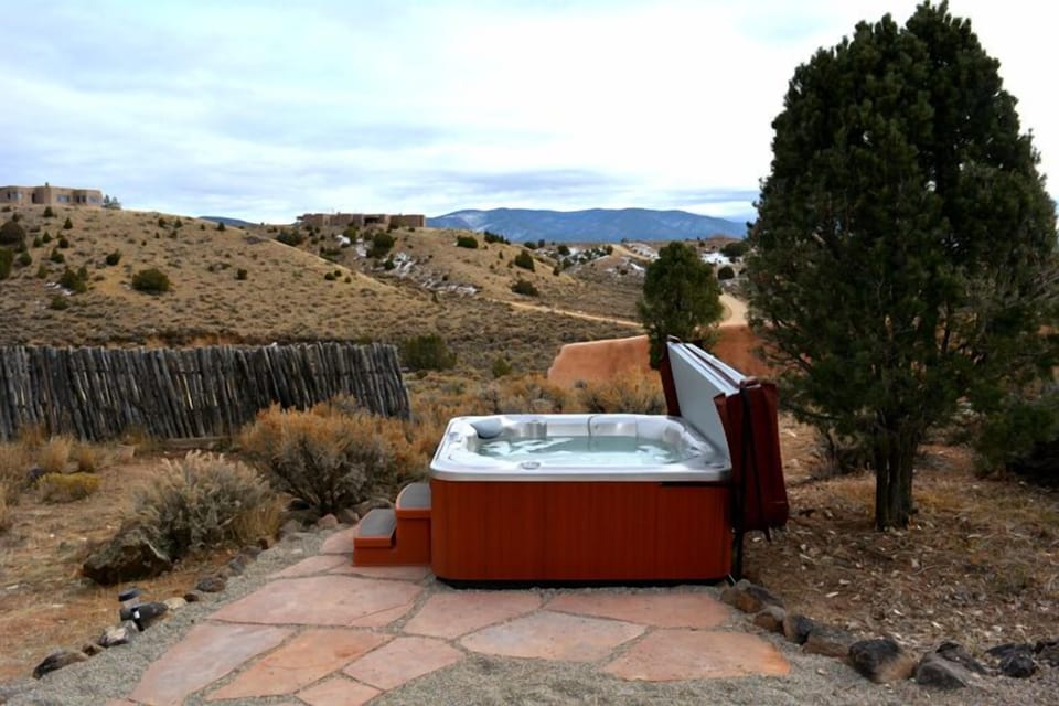 Flagstone walkway to private hot tub with mountain views and great stargazing