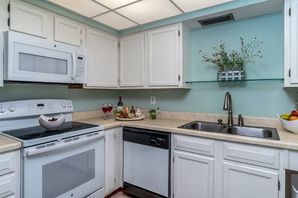Kitchen with Refrigerator, Electric Oven & Cooktop, Dishwasher & Microwave