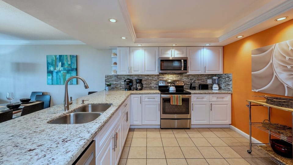 The kitchen is fully equipped with every appliance and tool needed...
