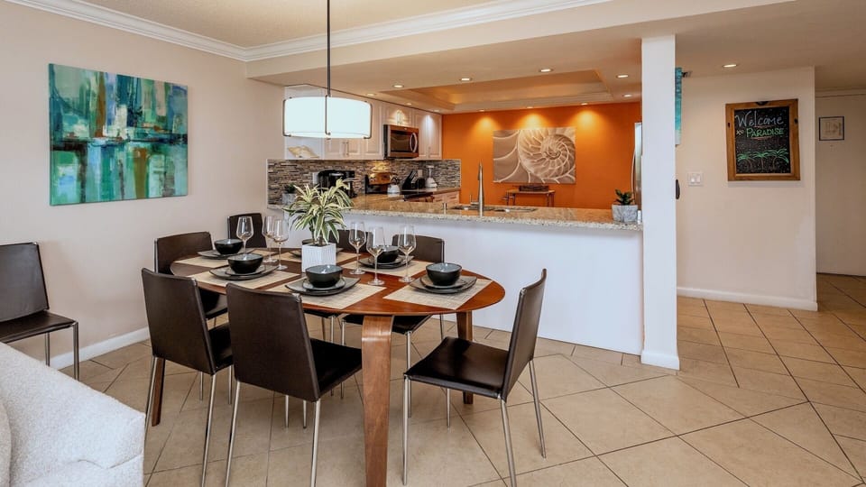 The kitchen is just beyond the living and dining area...