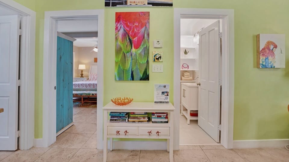 The recently renovated bathroom is located in the hall...