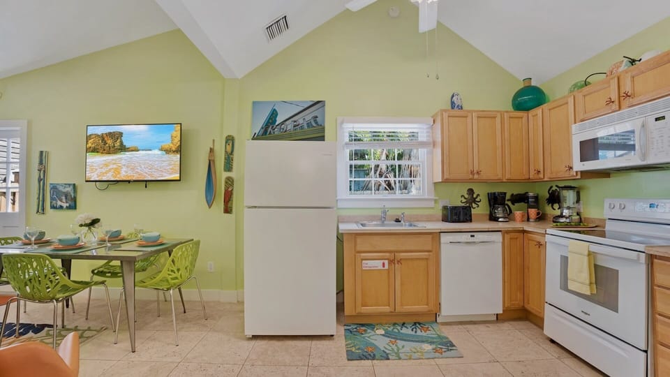 The kitchen is fully equipped with every appliance and tool needed...