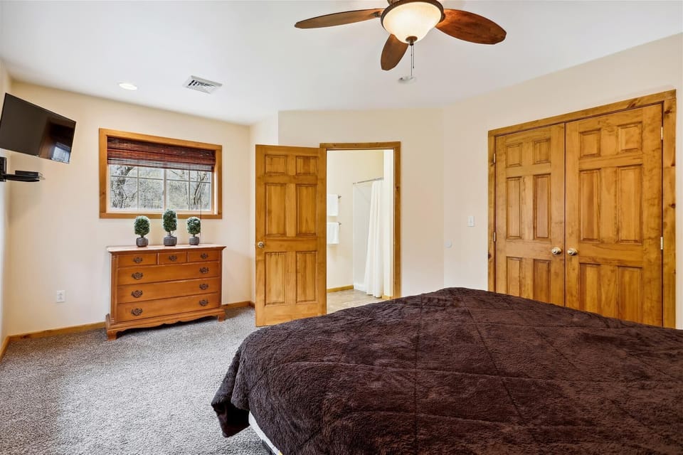 Bedroom 1 - Upper Level - King size bed. Linens and sheets provided and professionally cleaned.