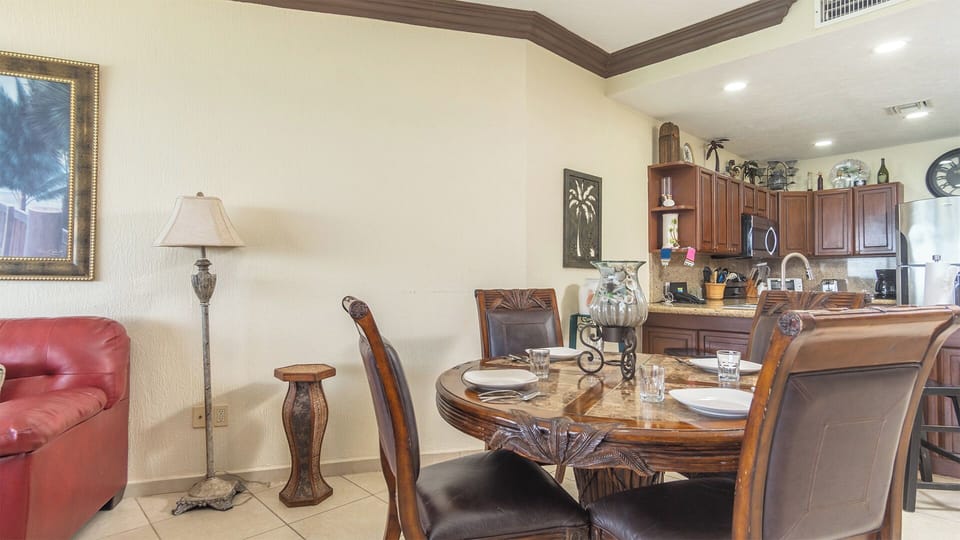 Dining table and kitchen.