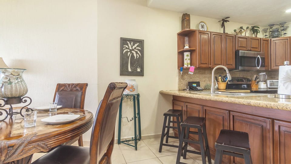 The bar stools at the kitchen counter.