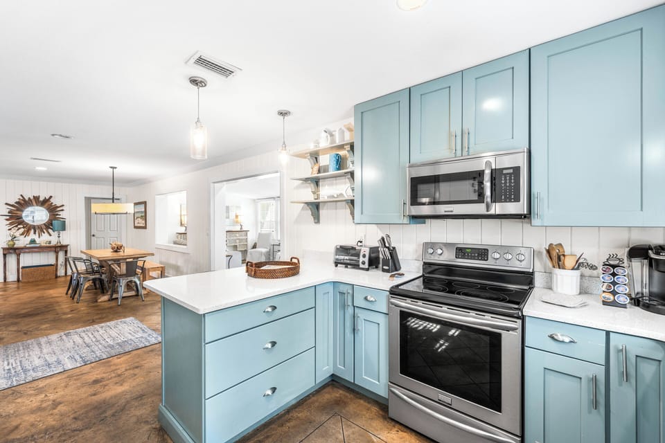 Fully Stocked Kitchen with Stainless Steel Appliances, Cambria Quartz Countertops,  Cookware & Kitchenware, & Breakfast Bar