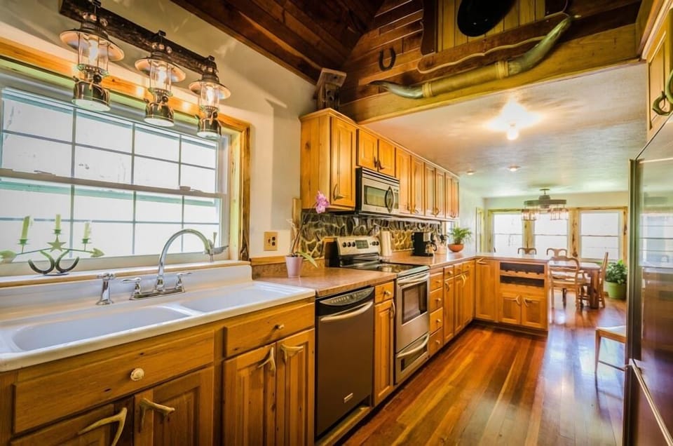 Kitchen - Main Level. Cozy type stocked kitchen with full sink, boiler and coffee maker.