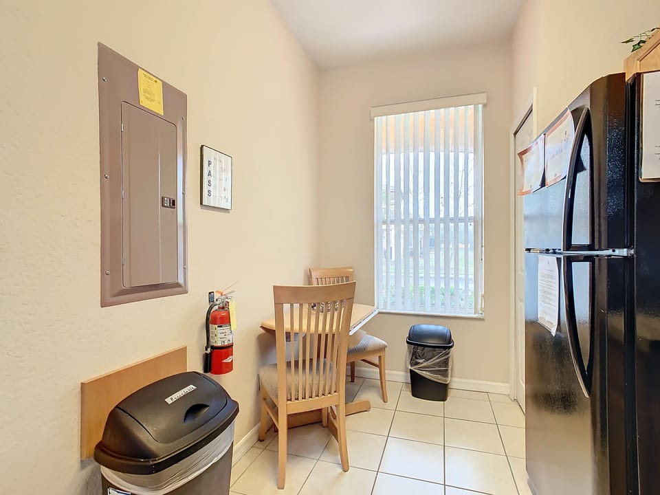 Cozy dining nook with natural light, perfect for enjoying meals or snacks.