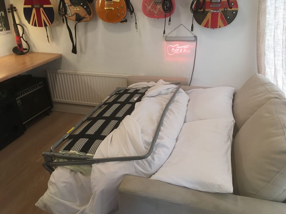 Sofabed folded back, but all ready and ‘made up’ for guests arrival.
