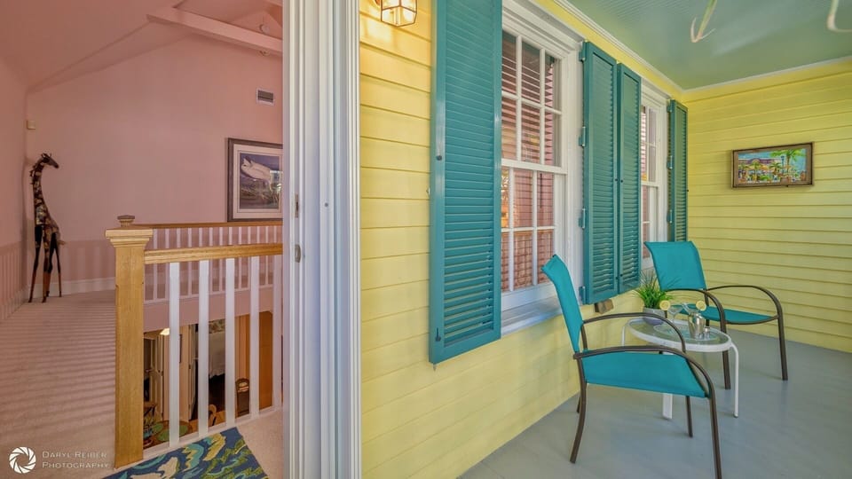 The front covered balcony offers a quiet outdoor space...