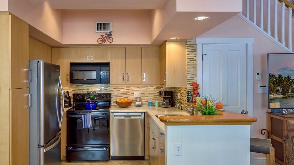 The kitchen is fully equipped with all of the appliances and tools you'll need...