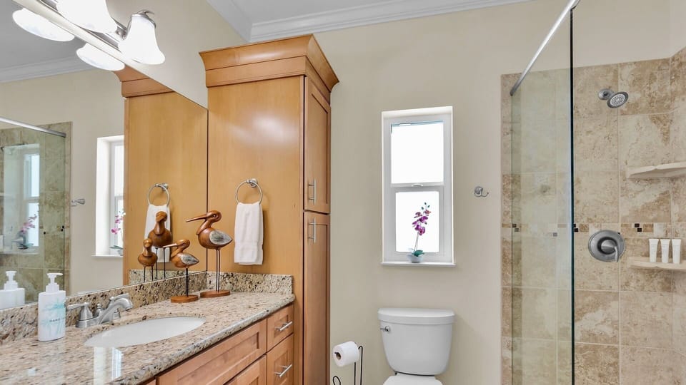 The granite vanity combines everyday functionality with plenty of storage...