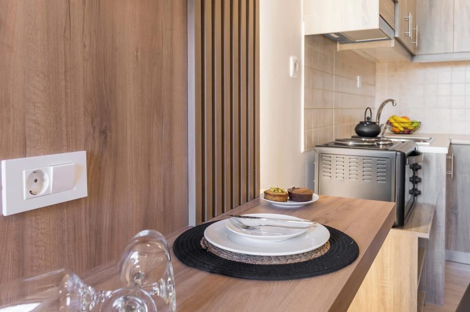 Royal Studio With Courtyard View | Private kitchen | Full-size fridge, stovetop, espresso maker, coffee/tea maker
