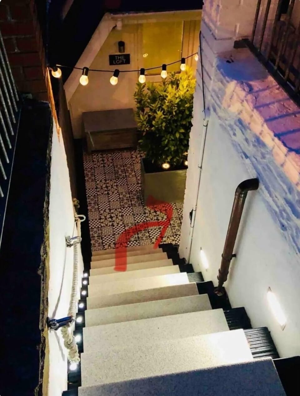 Stairs from street level down to The Bolthole (opposite The Loft apartment)