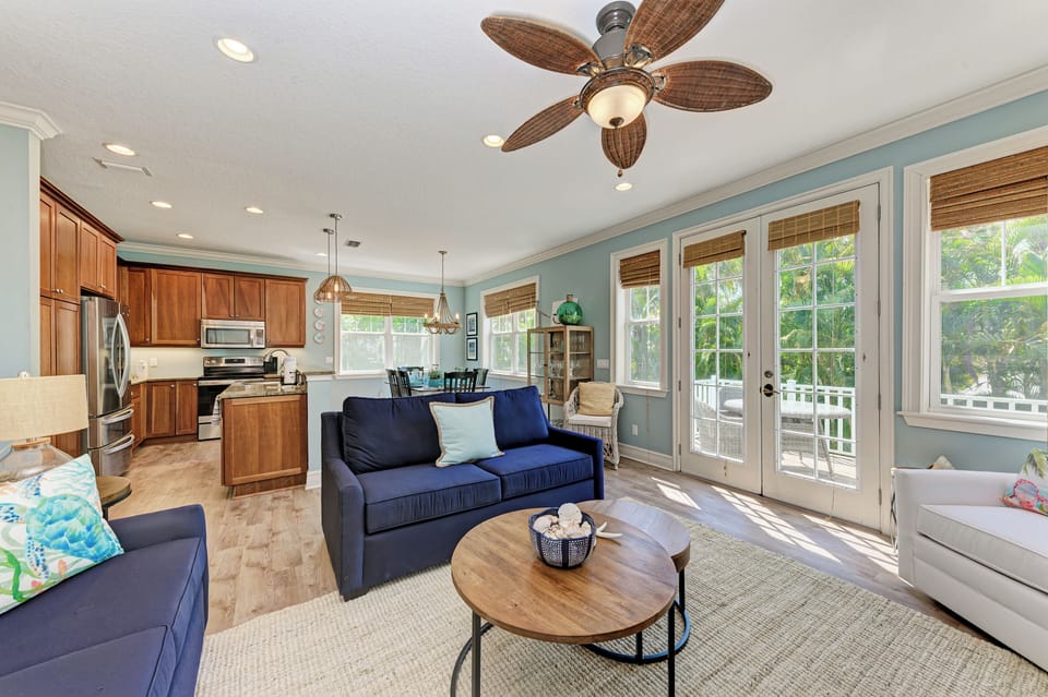 Main level open concept living, dining and kitchen area