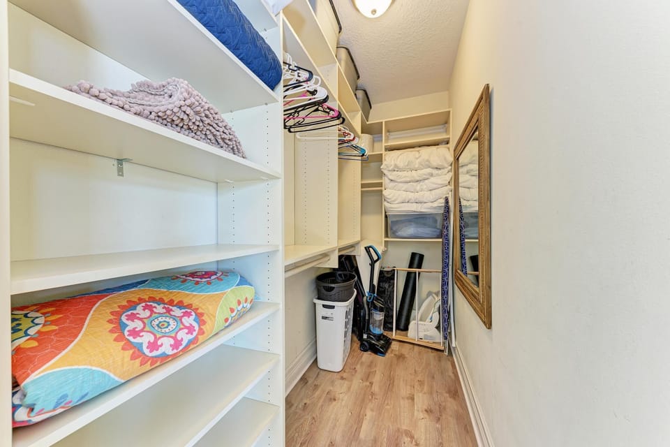 Large walk-in closet for main level master ensuite
