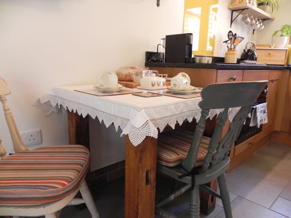Kitchen with adjacent dining table and chairs