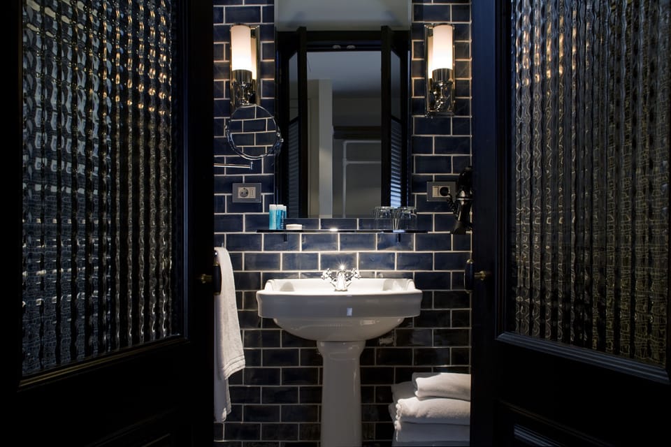 Suite, 1 Bedroom | Bathroom | Shower, rainfall showerhead, eco-friendly toiletries, hair dryer