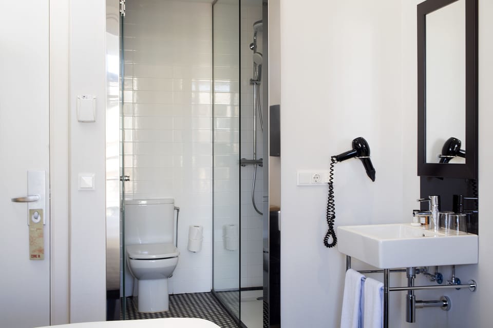 Shower, rainfall showerhead, eco-friendly toiletries, hair dryer