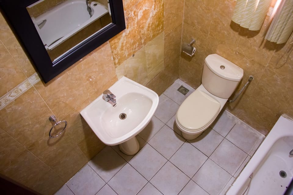 Deep soaking tub, rainfall showerhead, free toiletries, towels