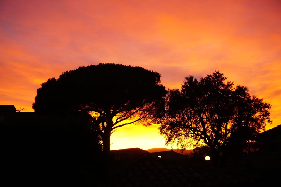 In the other direction: Sunset behind the house