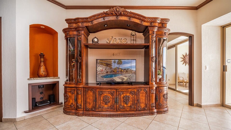 THe beautiful entertainment center with TV.