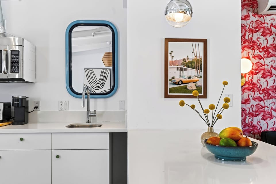 The Rosalie Room 2's ensuite bathroom features a walk-in shower and a bright, modern vanity.