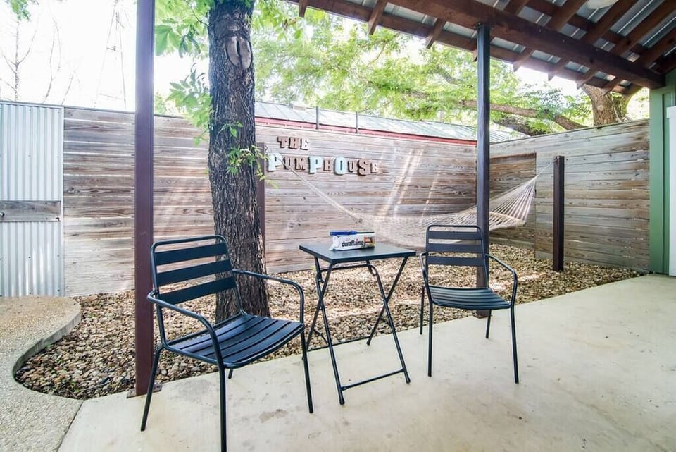 Courtyard hammock and bistro set – perfect for coffee or wine outdoors.