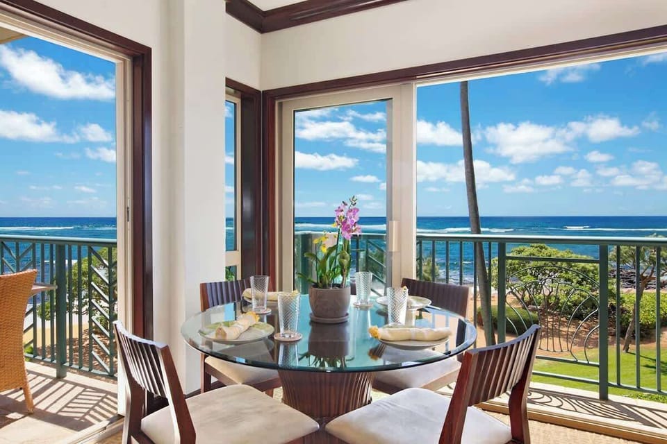Dine with sweeping ocean & mountain views from your private lanai