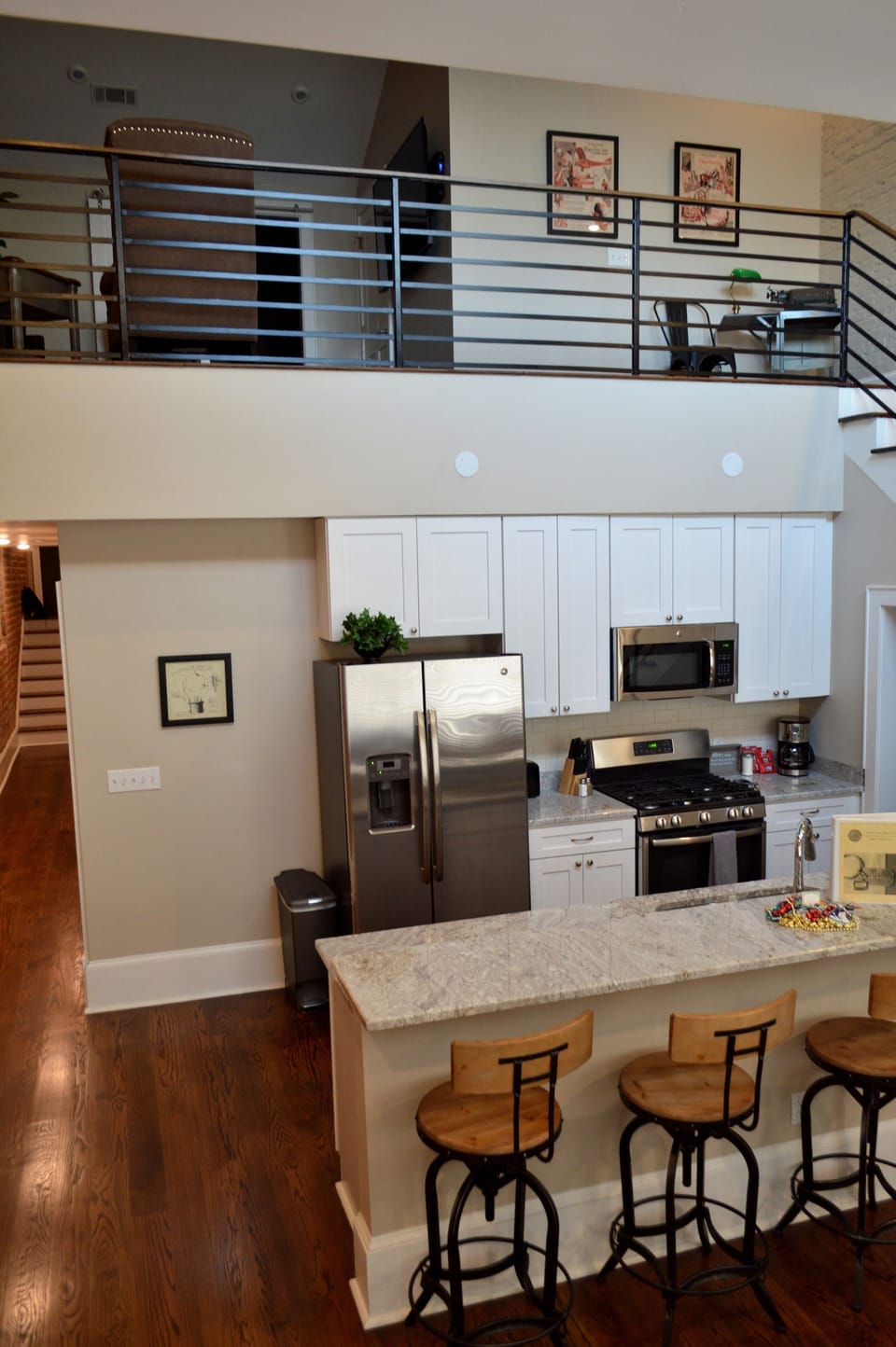 Kitchen and dining on main level, living room up