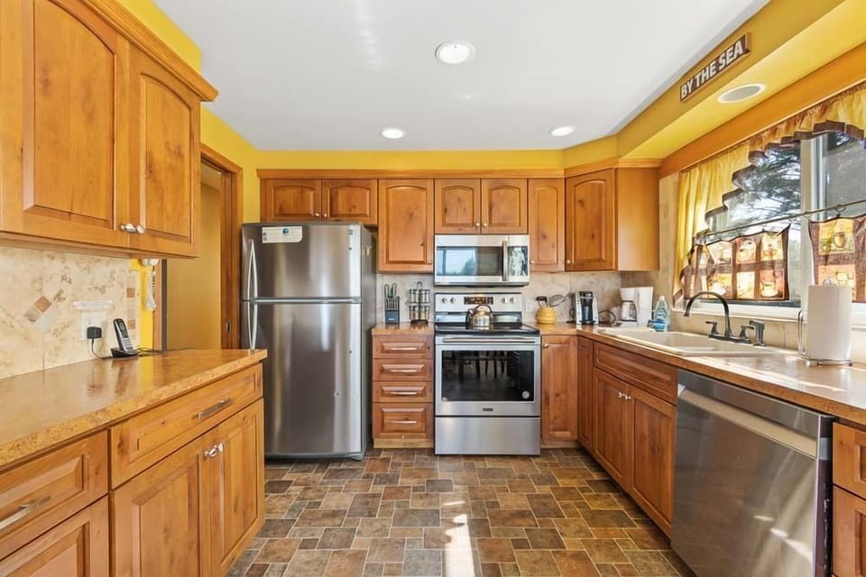 Modernized kitchen with upgraded appliances.