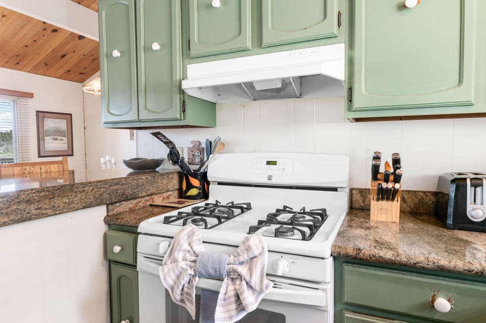 Kitchen - Full kitchen with stove/oven, refrigerator, dishwasher, microwave, blender, toaster, coffee maker, dishes, pots/pans, & more.